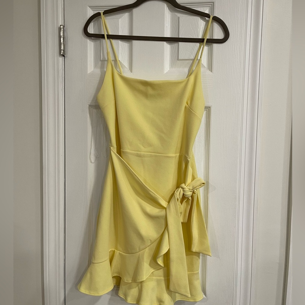 Yellow spandex dress with ruffle detail